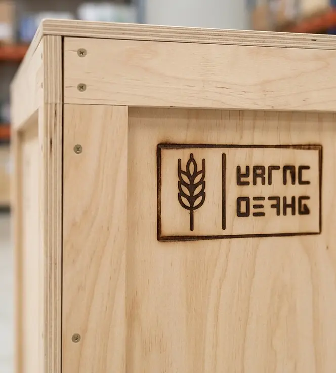 IPPC stamp marked on a heat treated wooden export crate confirming ISPM-15 compliance